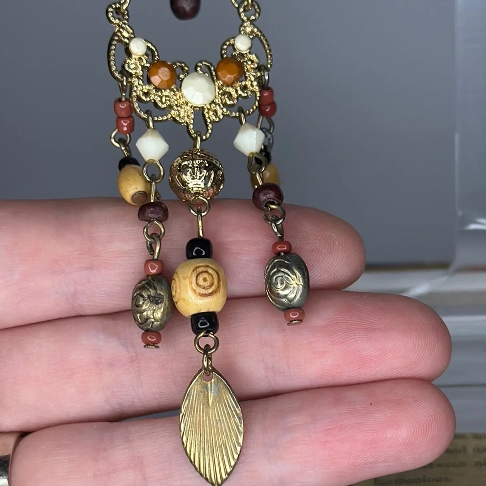 Bohemian Gold and Brown Chandelier Earrings with Leaf Charms - Picture 2 of 3